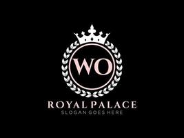 Letter WO Antique royal luxury victorian logo with ornamental frame. vector