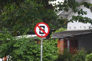 Magelang, Indonesia, 2022 - photo of traffic signs prohibited from stopping on the side of the road