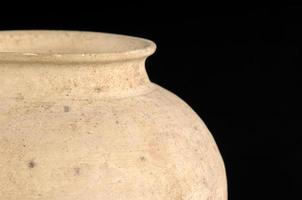 A clay vase isolated on a white background photo