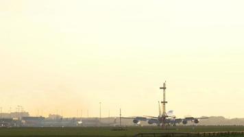 AMSTERDAM, THE NETHERLANDS JULY 25, 2017 - AirBrifgeCargo Boeing 747 VQ BRH braking after landing at runway 06 Kaagbaan at sunrise. Shiphol Airport, Amsterdam, Holland video