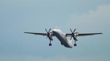 AMSTERDAM, THE NETHERLANDS JULY 24, 2017 - De Havilland Canada Dash 8 400, G ECOR of FlyBe takeoff overhead at Schiphol Airport, Amsterdam. Tourism and travel concept video