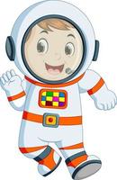 Cartoon boy wearing astronaut costume vector