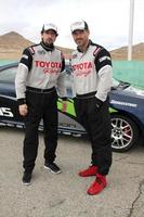 LOS ANGELES, MAR 17 - Adrien Brody Eddie Cibrian at the training session for the 36th Toyota Pro Celebrity Race to be held in Long Beach, CA on April 14, 2012 at the Willow Springs Racetrack on March 17, 2012 in Willow Springs, CA photo