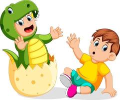 the boy shocked when his friend came out from the egg and using the Tyrannosaurus Rex costume vector