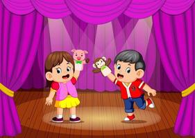 the children playing puppet in the stage vector