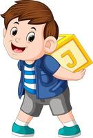 young boy playing alphabet block vector