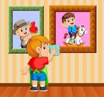 the boy clean up the frame photo with the towel in his house vector