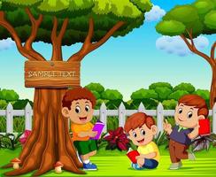 the children reading book and relax near the tree vector