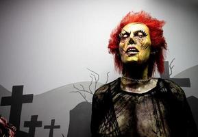 Scary Female Zombie With Red Hair photo