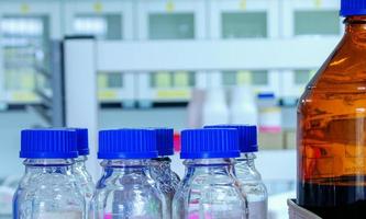 glass bottles in laboratory photo