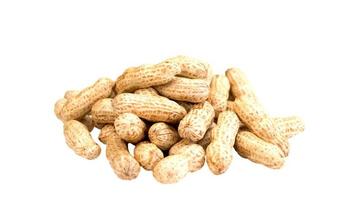 isolated pile of raw peanuts photo