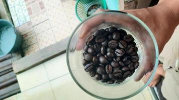 Thick black and large Bali Robusta coffee beans photo