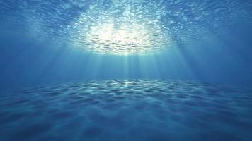 blauw oceaan bodem met bubbels en licht stralen diep onderwater- achtergrond animatie video