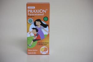 Magelang,Indonesia,2022-Plain background photo isolated with fever-reducing syrup used when a child has a fever.