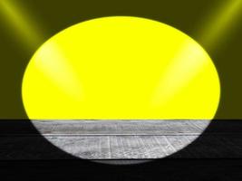 Old gray plank, dark edges, yellow background  Spotlight on top, concept, product display. photo