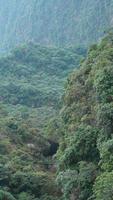 The beautiful mountains landscapes with the green forest and erupted rock cliff as background in the countryside of the China photo