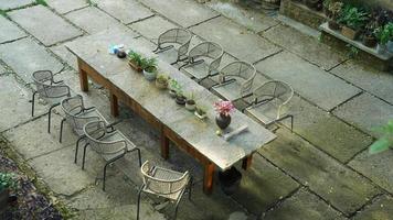 The beautiful garden view with the flowers and stone tables in the countryside village of the China photo