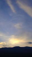 Twilight and dawn sky with cumulus cloud vertical time lapse in an evening. video