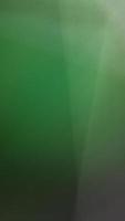 Imaginative blurred green shades, Blur green gradient abstract background. Mobile phone wallpaper. photo