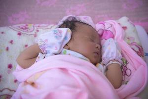 Close-up photo of a beautiful sleeping baby.