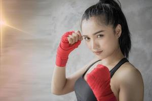 Young and beautiful female boxer photo