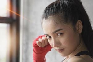 Young and beautiful female boxer photo