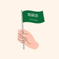 Cartoon Hand Holding Saudi Arabia Flag, Isolated Vector Drawing