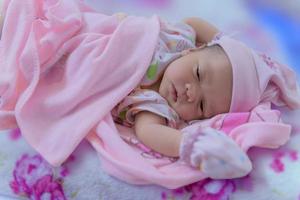 Close-up photo of a beautiful sleeping baby.