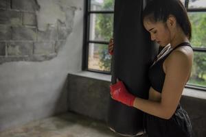 Young and beautiful female boxer photo