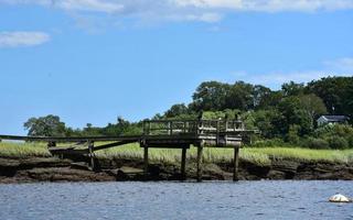 Scenic Wharf Along a Marsh and River photo