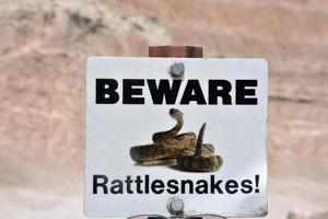 Beware of Rattlesnakes Sign in the Badlands photo