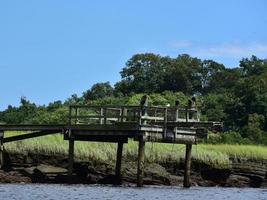 Landing Dock Over a Grass Marsh in Norwell photo