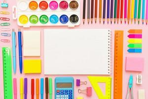 School note and landing on pink background. Back to school, home study creative photo