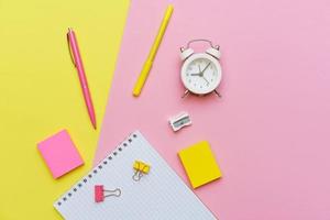 School note and landing on pink background. Back to school, home study creative photo