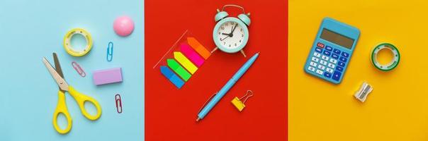 Various stationery for the school on a multi-colored background. Back to school photo