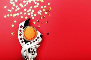 Golden Superprize with a scattering of stars on a red background. photo