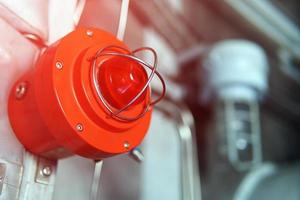 Red warning light of an emergency beacon at an industrial facility. photo