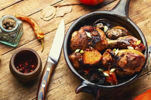 Chicken legs in soy sauce with pumpkin photo