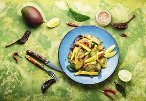 Delicious chicken breast and mango salad photo