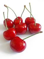 fresh juicy sweet cherry on white background photo
