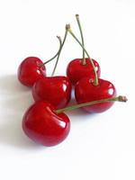 fresh juicy sweet cherry on white background photo