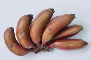 Banana on white background. Healthful banana collection. Ripe bunch of bananas photo