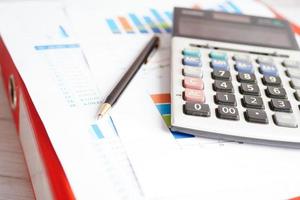 Pen on chart or graph paper. Financial, account, statistics and business data concept. photo