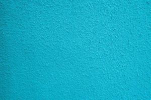 Cement concrete grunge wall texture background, turquoise blue and green color. photo