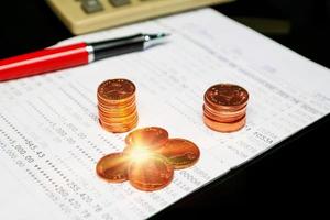 rows of coin on bookbank photo