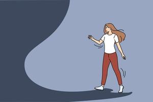 mujer joven ansiosa mira en un futuro desconocido. niña preocupada en el camino de la luz paso camino oscuro frente a la oscuridad y la incertidumbre. el miedo y el desafío, superar las dificultades. ilustración vectorial vector