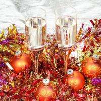 above view of glasses with orange Xmas decorations photo