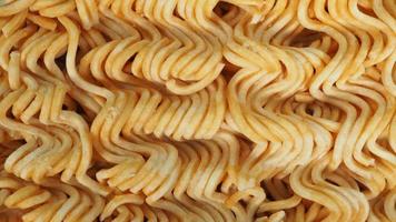 Close up of Raw or dried Instant noodle for texture and background.no people photo