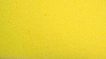 scourer pad in yellow color for texture background.no peeople photo