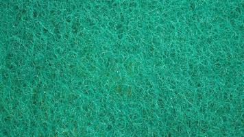 sponge Scourer pad in green color for texture and back ground. photo